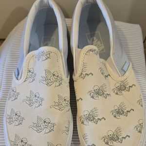 Vans Uni-sex Slip-On Sneakers in Cream with Angel & Skeleton Print